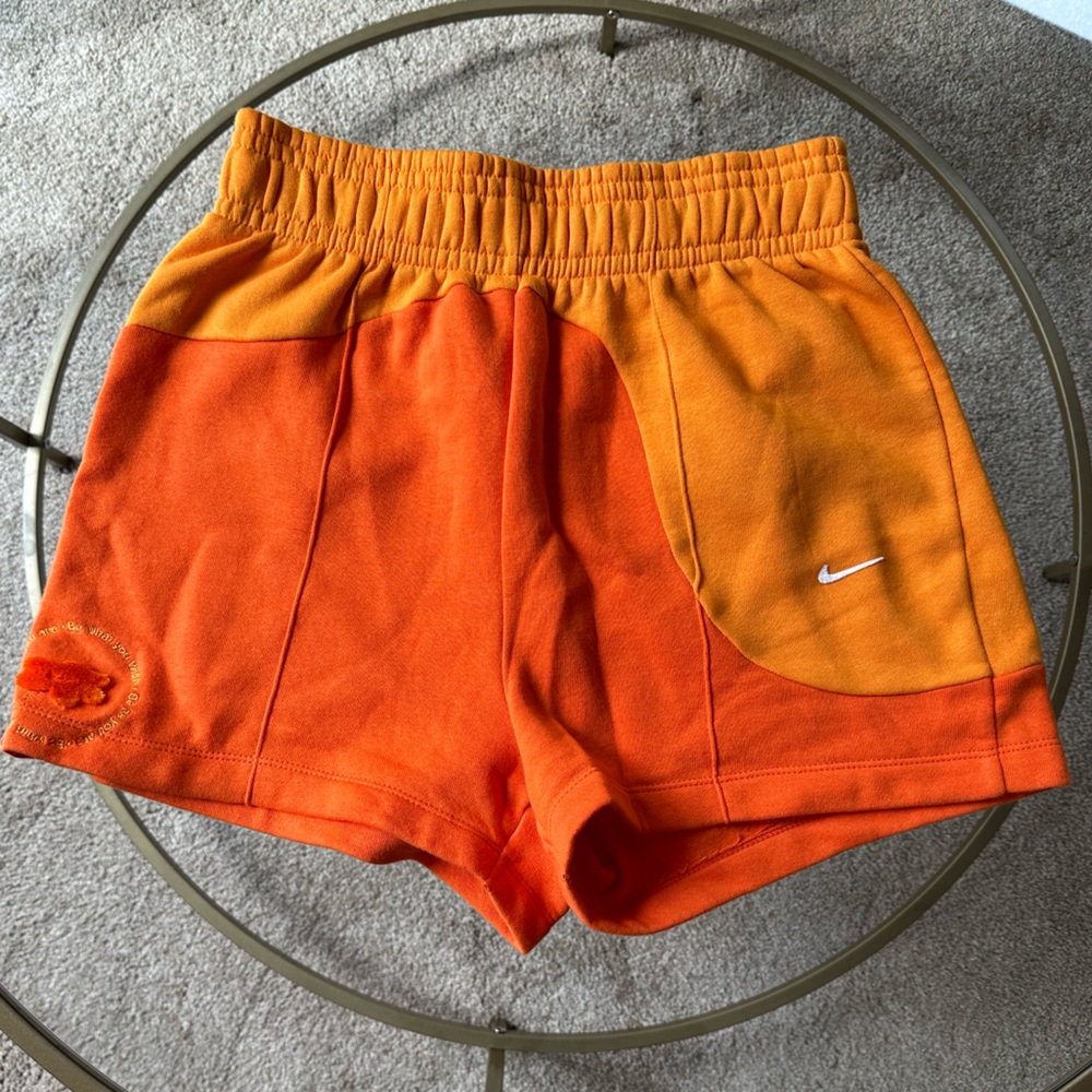 Orange Nike shorts women’s size small